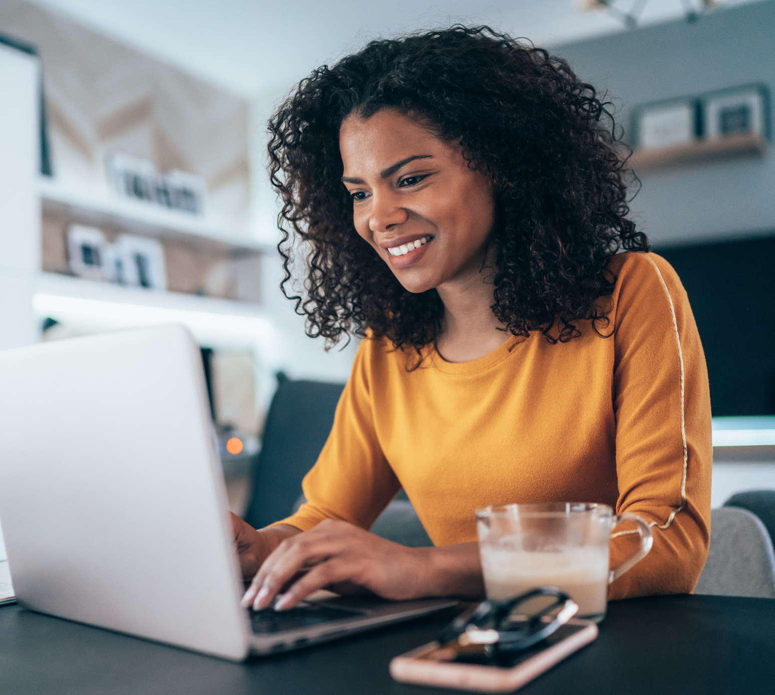 Woman working on laptop PC.