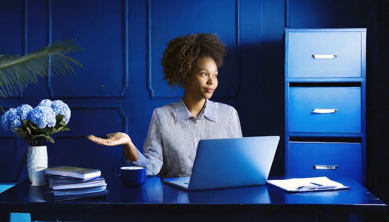 Woman working on laptop PC.