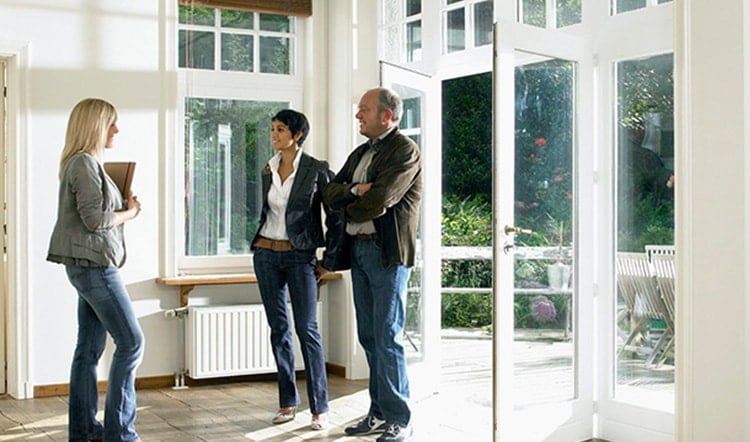 people talking in a house