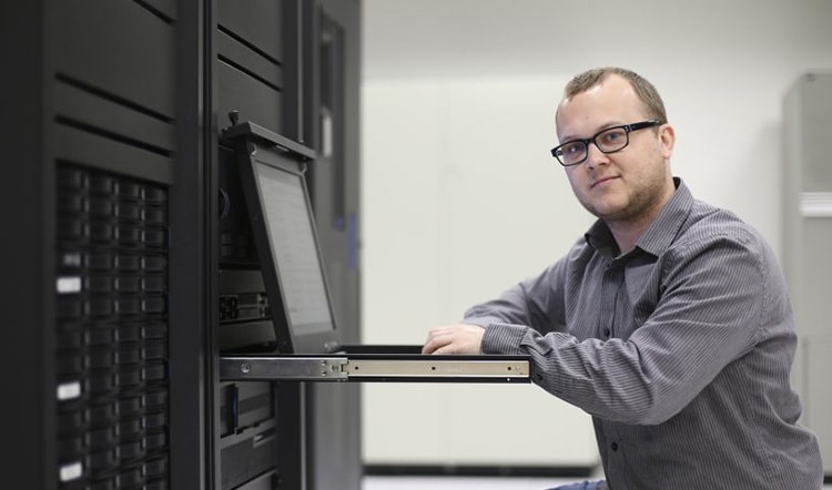 man working on laptop pc