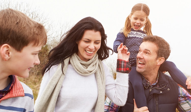 family posing for photo