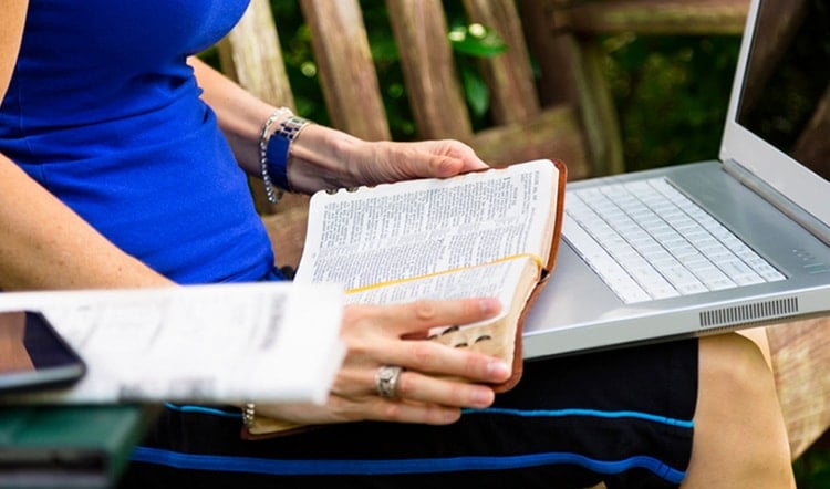 person reading bible