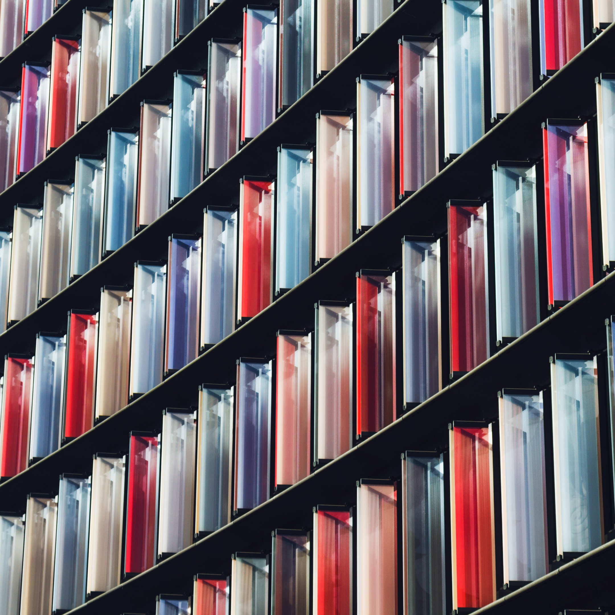Abstract image of colored disk cases for Carbonite auto backup.